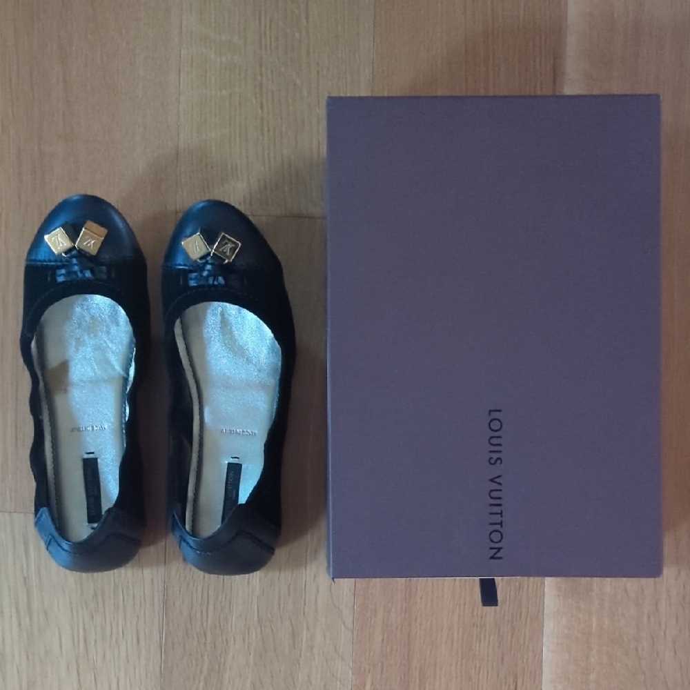 Louis Vuitton Black Flats with Gold Accents